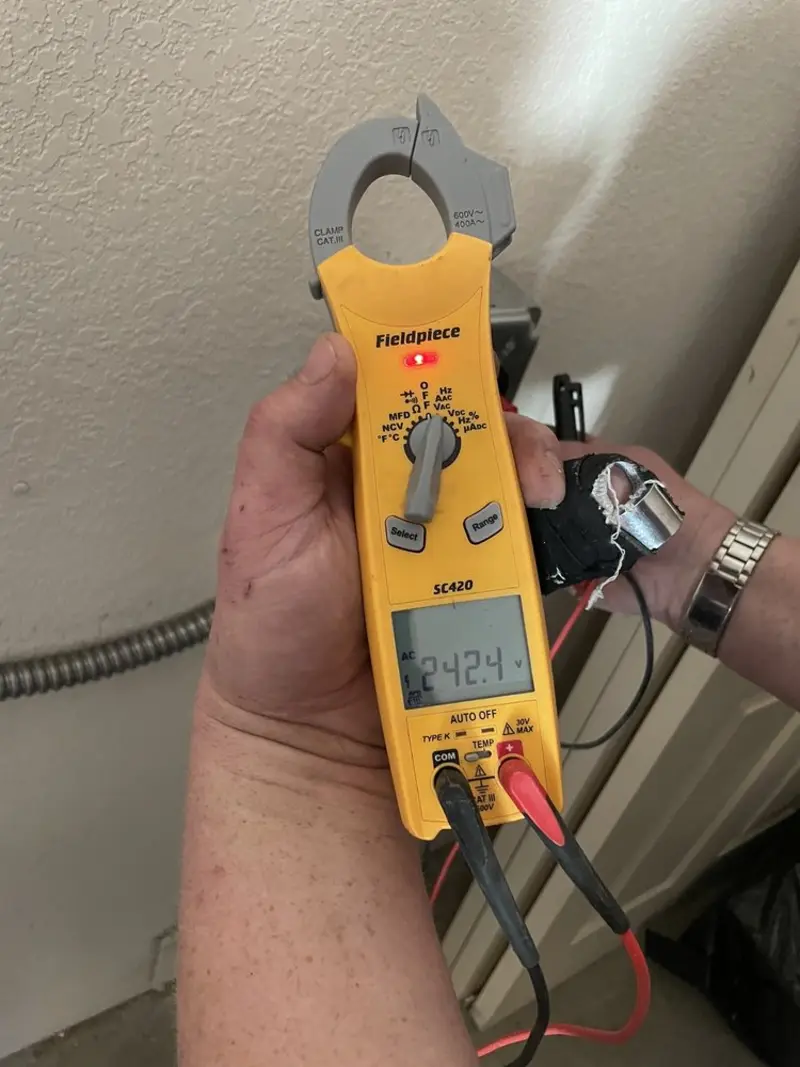 Voltage testing with clamp meter during Aluminum Wiring Replacement in Scarborough